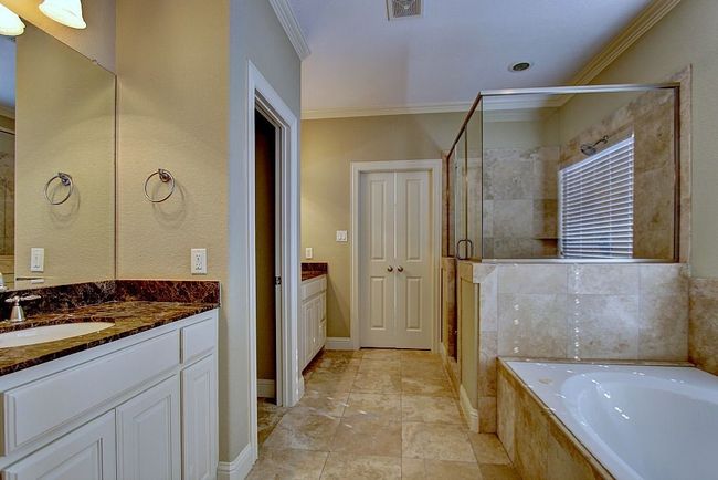 Master Bedroom with Dual Sinks, Garden Tub and Separate Shower | Image 16