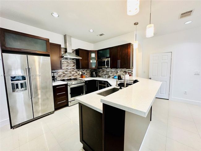 10886 Sw 242 Nd St, House other with 4 bedrooms, 2 bathrooms and null parking in Homestead FL | Image 11
