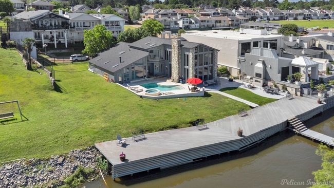 Birds eye view of property featuring a water view and a residential​​‌​​​​‌​​‌‌​‌‌​​​‌‌​​‌‌​‌​​​​​‌ view | Image 33