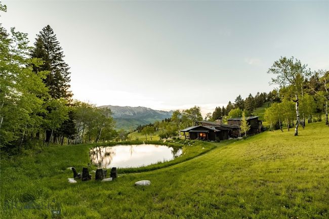 Interesting topography makes this property unique. It has a little bit of everything, spring fed ponds, aspen groves, rolling meadows and epic views from every corner. | Image 56