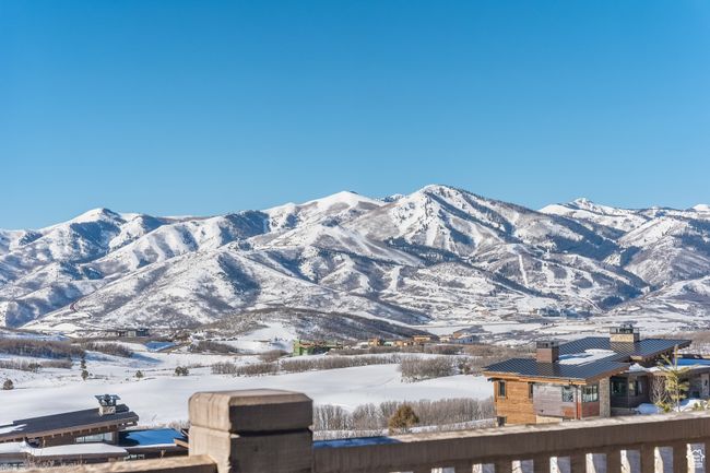 Note the hot tub and putting green and the mountain view. | Image 23