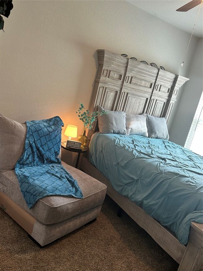 Bedroom featuring carpet | Image 7