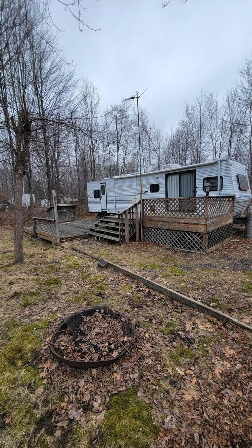 F7 Lot 58 Pathfinder Vlg, Hinckley, MN, 55037 | Card Image