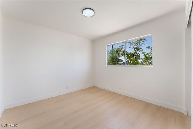 Empty room featuring light wood finished floors and baseboards | Image 41