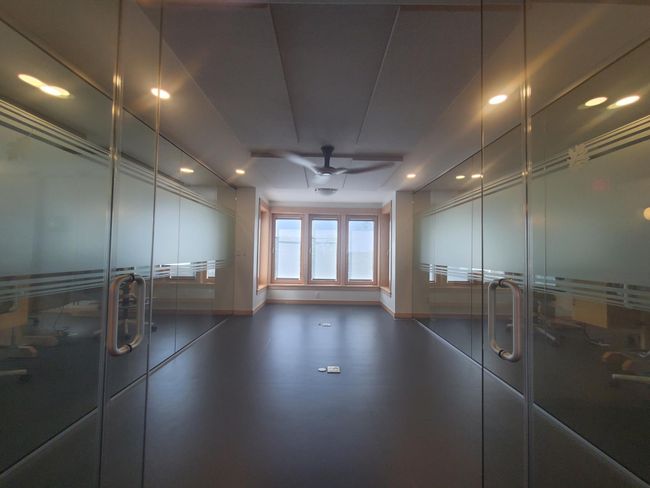 Upper level glass enclosed private office | Image 22