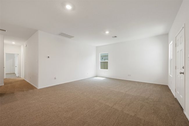Spare room featuring carpet floors and recessed lighting | Image 7