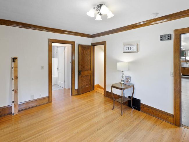Another view of the Ding room looking toward the hall and stairs going down | Image 32