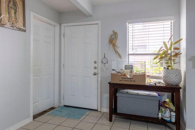 Entrance foyer featuring baseboards | Image 8