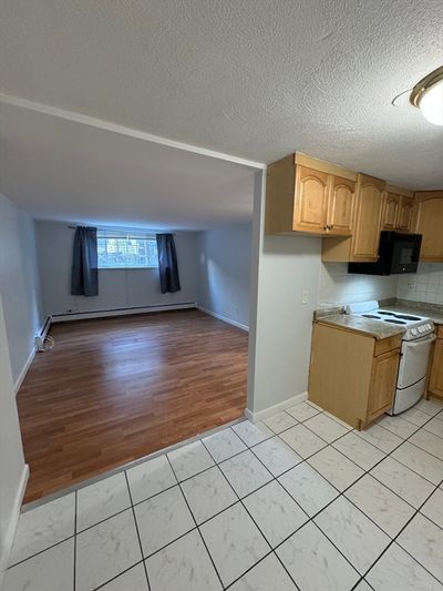 15 - 12 Woodland St, Condo with 1 bedrooms, 1 bathrooms and 1 parking in Everett MA | Image 1