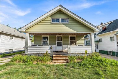 Bungalow-style home with covered porch | Image 1