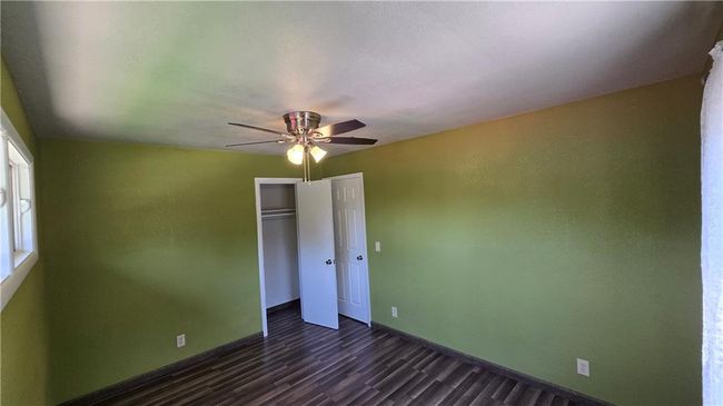 Bedroom 2 facing closet & entry door | Image 13