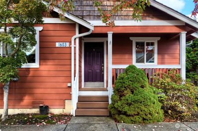 Durable Cement planked siding and composite decking on front porch. | Image 3