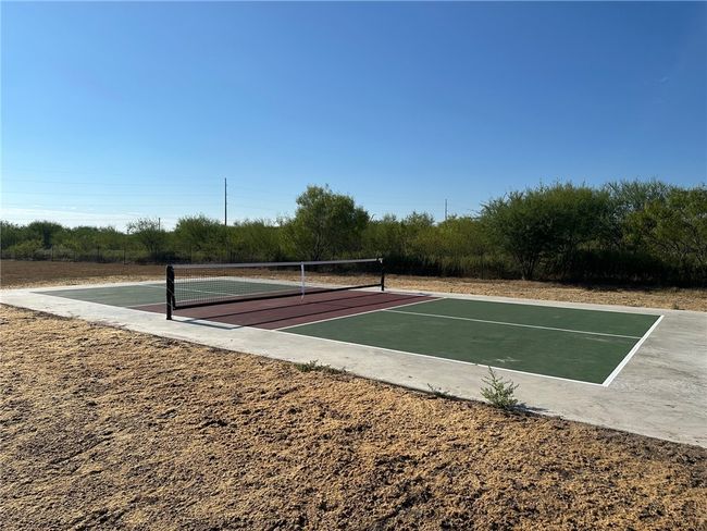 View of property's community with a tennis court | Image 21