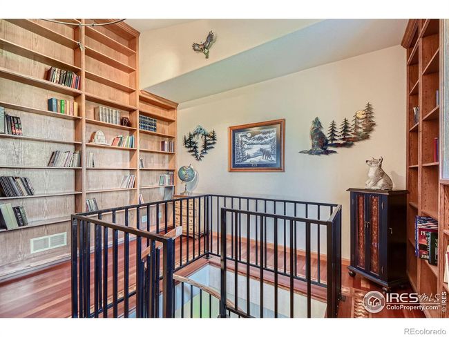 Library w/ spiral staircase to office below! | Image 19