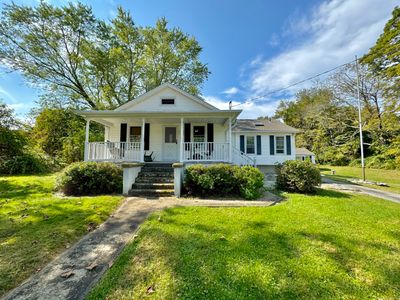 A spacious front lawn is just a tease for the large back yard | Image 3