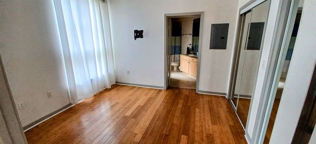 Ensuite Bathroom with Large Vanity Area and Tile Floors | Image 35