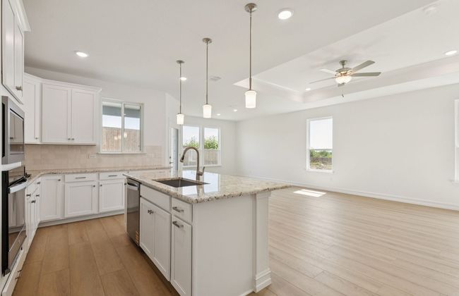 Open kitchen layout perfect for entertaining and creating a connected home environment *Real home pictured | Image 8