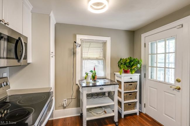 Entryway with baseboards and dark wood-style flooring | Image 17