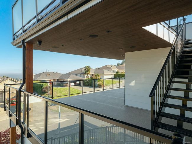 Balcony with Stairs going to Rooftop Patio | Image 45