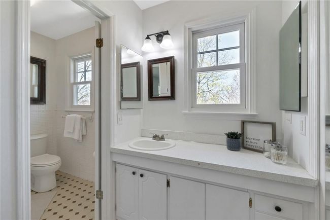 Primary bedroom bathroom with a walk in closet and views of the Hudson river. | Image 21