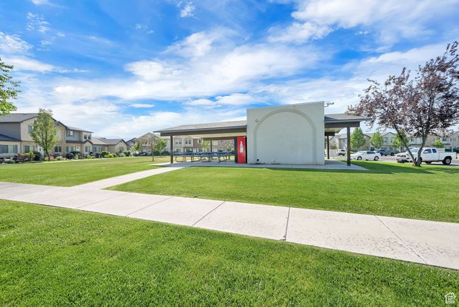 View of home's community featuring a residential view and a yard | Image 32