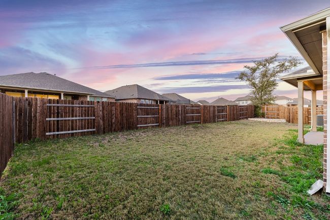 View of yard featuring a fenced backyard | Image 30