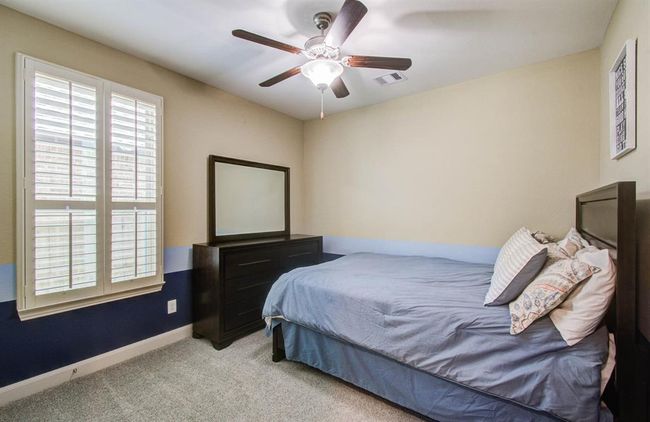 Bedroom 3. Located downstairs has brand new carpet. | Image 36