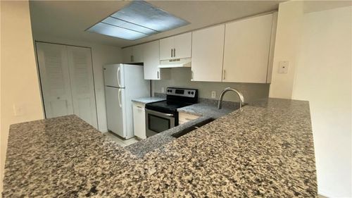 205-5045 Wiles Rd, Coconut Creek, FL, 33073-4210 | Card Image