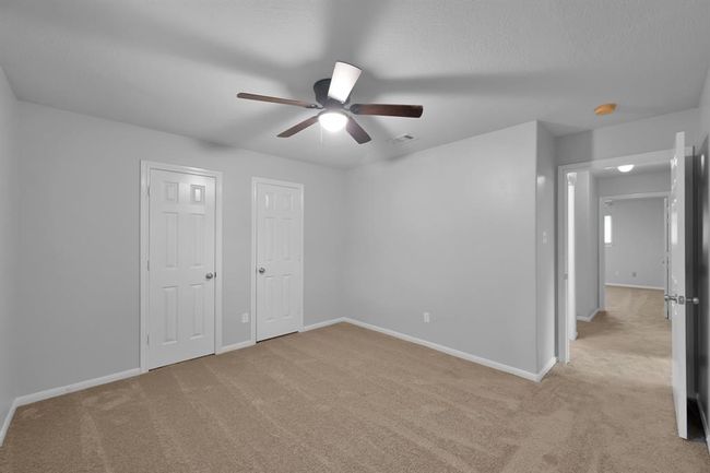 Alternate view of Bedroom 4. Did you notice that all bedrooms have ceiling fans? | Image 28
