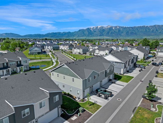 Aerial perspective of suburban area featuring a mountainous background | Image 25