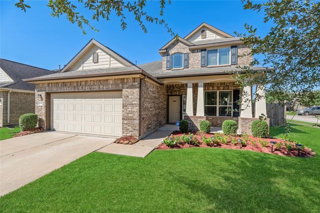 The home features a spacious two-car garage, providing ample room for parking. | Image 37