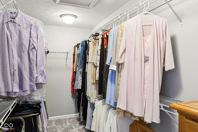 Primary suite walk in closet. | Image 37