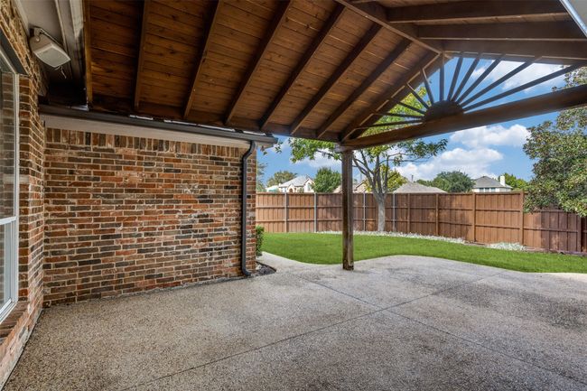 Covered patio offers year round living. | Image 18
