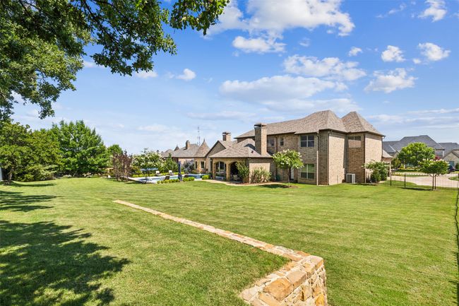 Sprawling Grassy Yard with Close to an Acre of Outdoor Space | Image 34