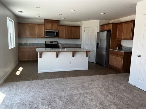 2015 Conadria Ave, Chowchilla, CA, 93610-8558 | Card Image