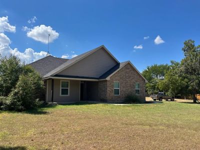 Rear view of house featuring a yard | Image 1