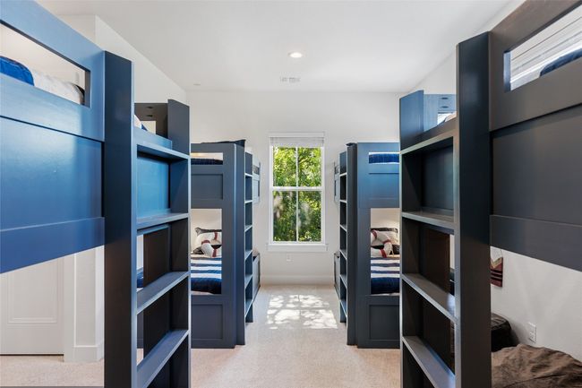 Bedroom 5 has 4 Twin Bunk Beds (Sleeps 8) | En-suite Bathroom | Walk-in Closet | 65" Samsung Smart TV | Image 35
