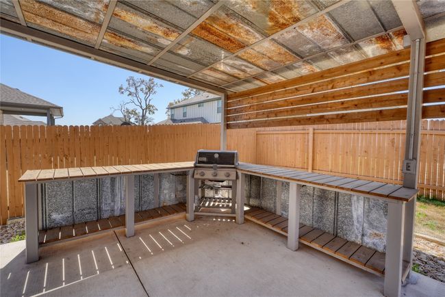 View of patio featuring a grill and fence | Image 37