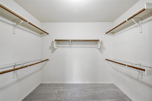 Walk in closet with carpet flooring | Image 20