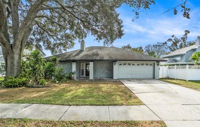 6308 Nesting Court, House other with 3 bedrooms, 2 bathrooms and null parking in Tampa FL | Image 1