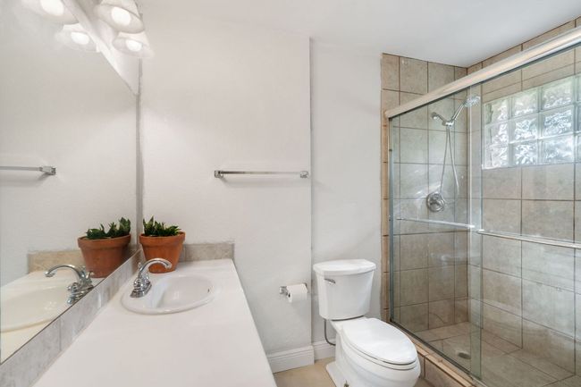 Primary bathroom with new walk in shower. | Image 8
