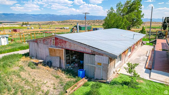 Exterior space with an outbuilding and a mountain view | Image 11