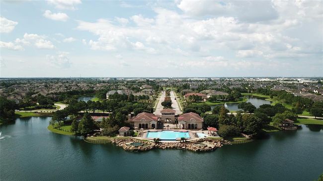 Lakes on Eldridge North Club house, pool open all year round, gym & play park. Bus stop for private schools. | Image 44