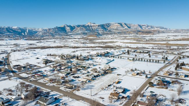 Snowy aerial view featuring a mountain view | Image 23