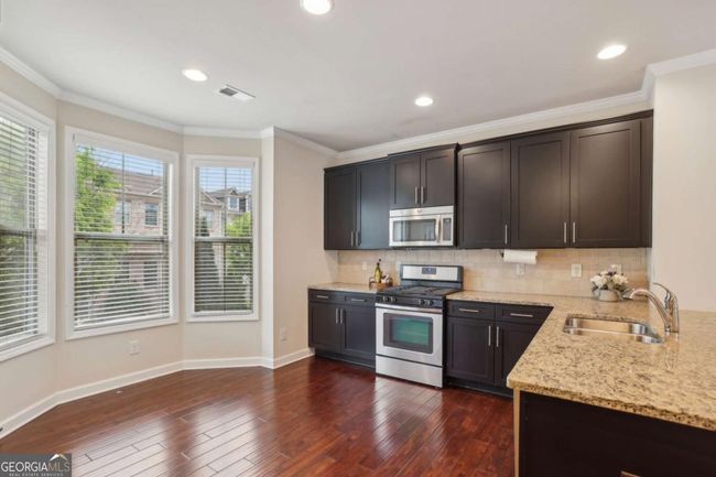 4934 Wyeth Way, House other with 3 bedrooms, 4 bathrooms and 2 parking in Johns Creek GA | Image 4