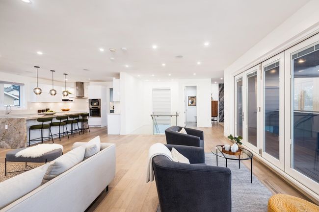 Living area featuring visible vents, recessed lighting, and light wood-style floors | Image 14