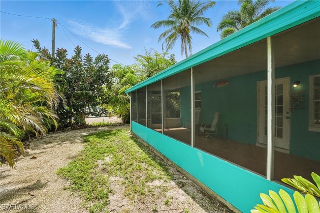 View of yard featuring a sunroom | Image 31