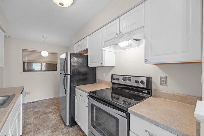 White cabinets add a modern touch | Image 13