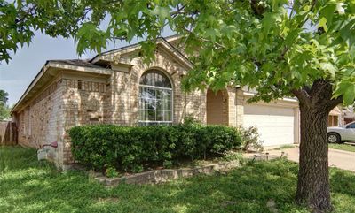 View of front facade featuring a garage | Image 3