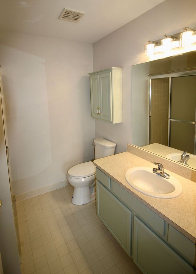 New toilet. sink and lighting in the primary bath. | Image 12